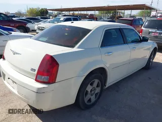 2007 Chrysler 300 Limited with VIN 2C3KA53G27H794893, listed as a IAAI auction lot 41851619 with 129,338 mi miles. Bid and sale history available at carsss.com. Image 4.