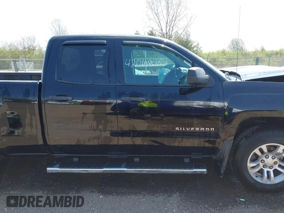 2014 Chevrolet Silverado 1500 LT with VIN 1GCVKREH9EZ282578, listed as a IAAI auction lot 42062801 with 163,158 mi miles and . Bid and sale history available at DreamBid. Image 13.