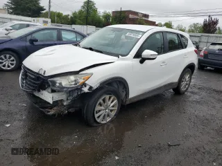 2016 Mazda CX-5 Sport z VIN JM3KE4BY2G0802376, wystawiony jako Copart lot #55976585 z przebiegiem 112 600 mil mil oraz Szkoda całkowita • Salvage title. Historia ofert i sprzedaży dostępna na DreamBid. Obrazek 1.