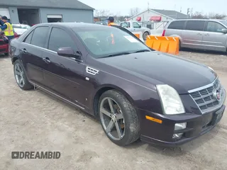 2009 Cadillac STS RWD z VIN 1G6DW67V690108305, wystawiony jako IAAI lot #41990232 z przebiegiem Nie podano mil oraz . Historia ofert i sprzedaży dostępna na DreamBid. Obrazek 1.