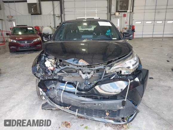 2020 Toyota C-HR LE with VIN JTNKHMBX1L1077957, listed as a IAAI auction lot 42159765 with 83,138 mi miles and . Bid and sale history available at DreamBid. Image 13.