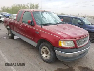 1999 Ford F-150 XL with VIN 1FTRX17L2XKB67208, listed as a IAAI auction lot 42072059 with 1 mi miles. Bid and sale history available at carsss.com. Image 1.