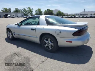2000 Pontiac Firebird Firebird z VIN 2G2FS22K5Y2116047, wystawiony jako Copart lot #58234695 z przebiegiem 155 876 mil mil oraz Tytuł czysty. Historia ofert i sprzedaży dostępna na DreamBid. Obrazek 2.