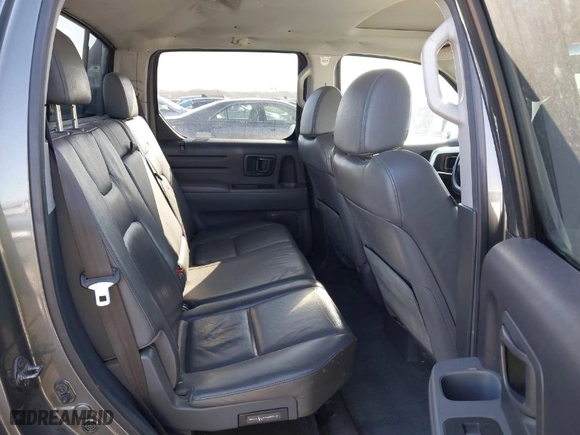 2007 Honda Ridgeline RTL w/Leather with VIN 2HJYK16547H526249, listed as a IAAI auction lot 41769625 with 173,168 mi miles. Bid and sale history available at carsss.com. Image 8.