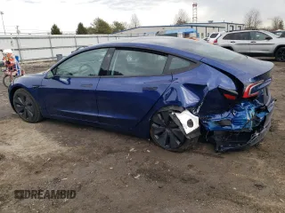 2025 Tesla Model 3 Long Range with VIN 5YJ3E1EA7SF889678, listed as a Copart auction lot 42952045 with 521 mi miles and Salvage Title. Bid and sale history available at DreamBid. Image 2.