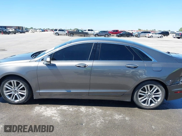 2014 Lincoln MKZ Hybrid с VIN 3LN6L2LU8ER822396, выставлен на аукционе IAAI как лот 42094086 с пробегом 166 203 миль миль и . История ставок и продаж доступна на DreamBid. Изображение 14.