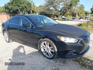 2014 Mazda 6 i Touring with VIN JM1GJ1T65E1146185, listed as a IAAI auction lot 42670755 with 171,481 mi miles and . Bid and sale history available at DreamBid. Image 1.