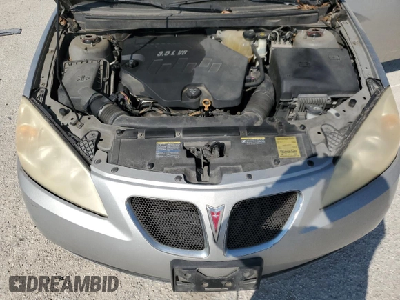 2008 Pontiac G6 z VIN 1G2ZG57N184198212, wystawiony jako Copart lot #70977674 z przebiegiem 118 154 mil mil oraz Czysty tytuł • Clean title. Historia ofert i sprzedaży dostępna na DreamBid. Obrazek 11.