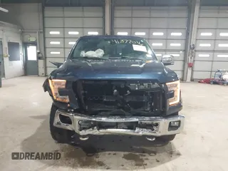 2015 Ford F-150 XLT with VIN 1FTEW1EG4FFB88589, listed as a IAAI auction lot 41877036 with 211,155 mi miles. Bid and sale history available at carsss.com. Image 13.