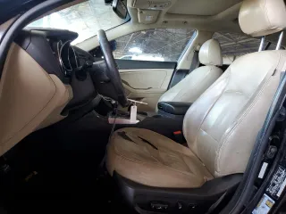 2013 Kia Optima EX z VIN 5XXGN4A75DG253693, wystawiony jako Copart lot #59227785 z przebiegiem 191 062 mil mil oraz Szkoda całkowita • Salvage title. Historia ofert i sprzedaży dostępna na DreamBid. Obrazek 7.