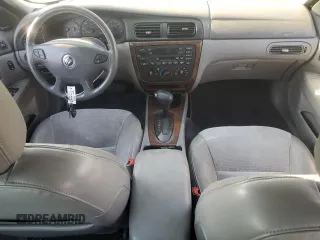 2000 Mercury Sable z VIN 1MEFM53U7YG640279, wystawiony jako Copart lot #70701264 z przebiegiem 118 790 mil mil oraz Szkoda całkowita • Salvage title. Historia ofert i sprzedaży dostępna na DreamBid. Obrazek 8.