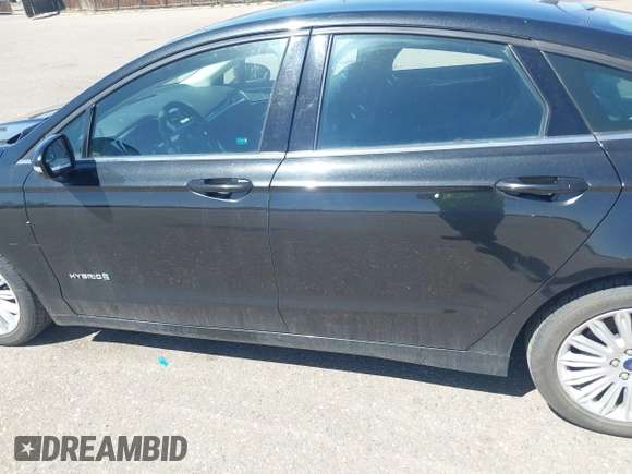 2013 Ford Fusion SE Hybrid with VIN 3FA6P0LUXDR298606, listed as a IAAI auction lot 41976525 with 121,660 mi miles. Bid and sale history available at carsss.com. Image 6.