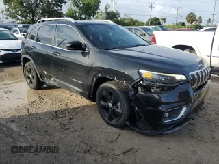 2019 Jeep Cherokee Limited with VIN 1C4PJLDN5KD135764, listed as a Copart auction lot 73637184 with 56,718 mi miles and Salvage Title. Bid and sale history available at DreamBid. Image 4.