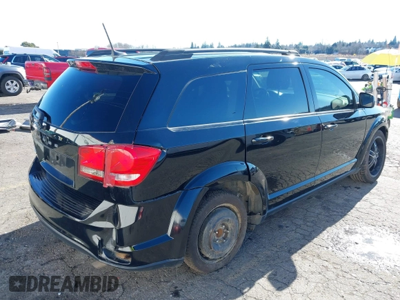 2019 Dodge Journey SE z VIN 3C4PDCBB1KT859686, wystawiony jako IAAI lot #41548860 z przebiegiem 68 955 mil mil oraz . Historia ofert i sprzedaży dostępna na DreamBid. Obrazek 6.