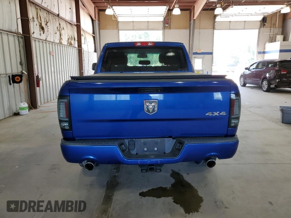 2014 Ram 1500 Express with VIN 3C6RR7KT4EG324804, listed as a Copart auction lot 58233005 with 103,306 mi miles and Salvage title. Bid and sale history available at DreamBid. Image 6.
