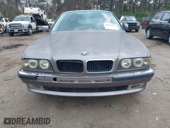 1998 BMW 7 Series 740il with VIN WBAGJ8323WDM23239, listed as a IAAI auction lot 41512630 with 221,673 mi miles. Bid and sale history available at carsss.com. Image 13.
