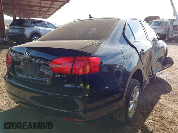 2012 Volkswagen Jetta Sedan SE w/Convenience PZEV with VIN 3VWDP7AJ1CM375679, listed as a IAAI auction lot 41529217 with 131,866 mi miles. Bid and sale history available at carsss.com. Image 4.