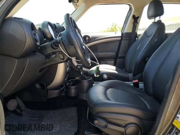 2014 MINI Countryman with VIN WMWZB3C56EWR38919, listed as a Copart auction lot 61385865 with 127,368 mi miles and Salvage title. Bid and sale history available at DreamBid. Image 7.