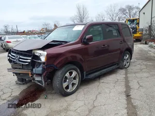 2012 Honda Pilot EX-L with VIN 5FNYF4H65CB045796, listed as a IAAI auction lot 39867772 with 104,061 mi miles. Bid and sale history available at carsss.com. Image 2.