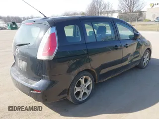2008 Mazda 5 Grand Touring with VIN JM1CR29L980322577, listed as a IAAI auction lot 41797022 with 144,494 mi miles and . Bid and sale history available at DreamBid. Image 4.