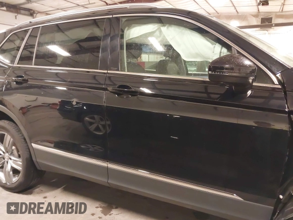 2021 Volkswagen Tiguan SE with VIN 3VV2B7AXXMM034880, listed as a IAAI auction lot 41979636 with 34,490 mi miles and . Bid and sale history available at DreamBid. Image 14.