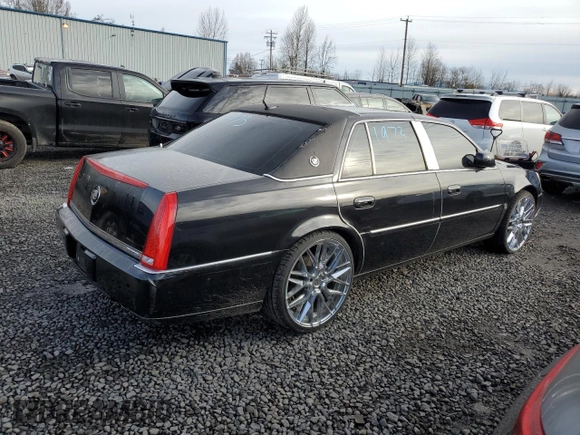 2006 Cadillac DTS 1SD z VIN 1G6KD57Y16U140102, wystawiony jako Copart lot #46145435 z przebiegiem 95 567 mil mil oraz Szkody całkowita. Historia ofert i sprzedaży dostępna na DreamBid. Obrazek 3.