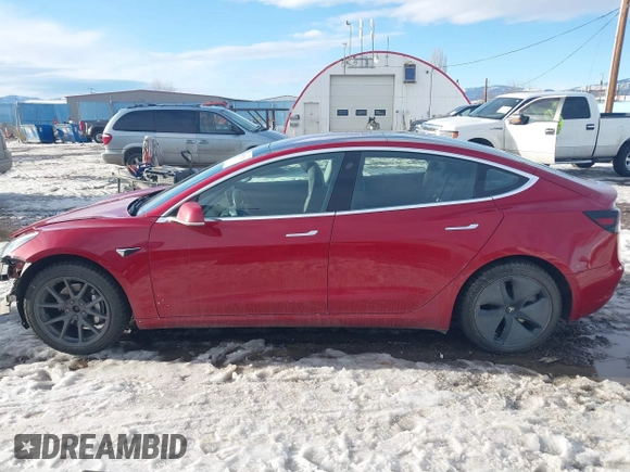2018 Tesla Model 3 Long Range Battery with VIN 5YJ3E1EB0JF064041, listed as a IAAI auction lot 41562239 with 54,720 mi miles and . Bid and sale history available at DreamBid. Image 15.
