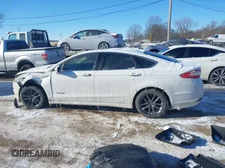 2013 Ford Fusion SE Hybrid with VIN 3FA6P0LU8DR272165, listed as a IAAI auction lot 41333539 with 196,843 mi miles. Bid and sale history available at carsss.com. Image 13.