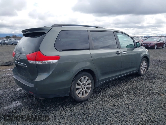 2011 Toyota Sienna XLE with VIN 5TDDK3DCXBS003666, listed as a IAAI auction lot 41807992 with 156,699 mi miles. Bid and sale history available at carsss.com. Image 4.