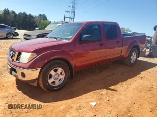 2008 Nissan Frontier SE with VIN 1N6AD09U68C450953, listed as a Copart auction lot 50801985 with 152,597 mi miles and Salvage title. Bid and sale history available at DreamBid. Image 1.