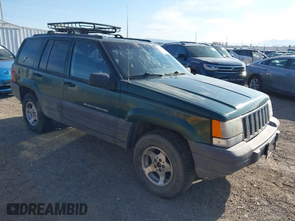 1998 Jeep Grand Cherokee Laredo with VIN 1J4GZ58S5WC362365, listed as a IAAI auction lot 41891397 with 246,673 mi miles. Bid and sale history available at carsss.com. Image 1.