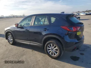 2015 Mazda CX-5 Sport z VIN JM3KE2BE6F0491107, wystawiony jako Copart lot #42462395 z przebiegiem 82 528 mil mil oraz Szkoda całkowita • Salvage title. Historia ofert i sprzedaży dostępna na DreamBid. Obrazek 2.