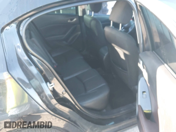 2016 Mazda 3 i Sport with VIN 3MZBM1K77GM317551, listed as a IAAI auction lot 41531610 with 199,974 mi miles and . Bid and sale history available at DreamBid. Image 8.