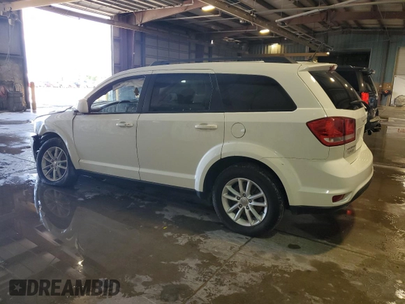 2017 Dodge Journey SXT with VIN 3C4PDCBG0HT572165, listed as a Copart auction lot 56673495 with Not provided miles and Salvage title. Bid and sale history available at DreamBid. Image 2.