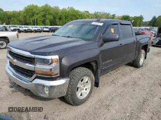 2016 Chevrolet Silverado 1500 LT with VIN 3GCUKREC5GG164823, listed as a Copart auction lot 52928575 with 221,836 mi miles and Clean Title. Bid and sale history available at DreamBid. Image 1.