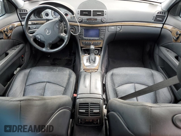 2005 Mercedes-Benz E 5.0L with VIN WDBUF70J45A645154, listed as a Copart auction lot 82883524 with 134,088 mi miles and Salvage Title. Bid and sale history available at carsss.com. Image 8.
