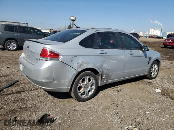 2008 Ford Focus SE with VIN 1FAHP35NX8W179702, listed as a Copart auction lot 43032555 with 101,309 mi miles and Salvage Title. Bid and sale history available at carsss.com. Image 3.