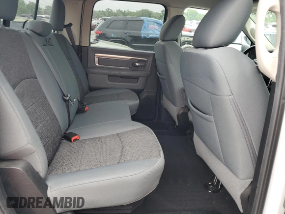 2018 Ram 1500 Lone Star Silver with VIN 1C6RR6LT6JS266013, listed as a Copart auction lot 56895915 with 136,453 mi miles and Salvage title. Bid and sale history available at DreamBid. Image 10.
