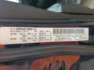 2012 Dodge Durango SXT z VIN 1C4RDJAG5CC322147, wystawiony jako Copart lot #61288635 z przebiegiem 297 224 mil mil oraz Czysty tytuł • Clean title. Historia ofert i sprzedaży dostępna na DreamBid. Obrazek 13.