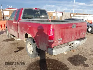 2001 Ford F-150 XL with VIN 1FTRX18L21NB46718, listed as a IAAI auction lot 41477101 with 156,702 mi miles. Bid and sale history available at carsss.com. Image 3.