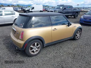 2005 MINI Hardtop with VIN WMWRC33555TK61361, listed as a IAAI auction lot 41940037 with 145,028 mi miles and . Bid and sale history available at DreamBid. Image 4.