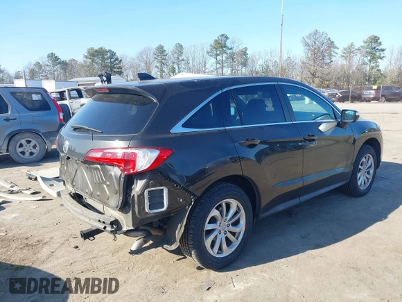 2016 Acura RDX with VIN 5J8TB4H36GL011656, listed as a IAAI auction lot 41421569 with 128,005 mi miles. Bid and sale history available at carsss.com. Image 4.