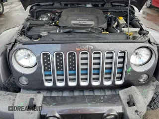 2016 Jeep Wrangler Unlimited 75th Anniversary with VIN 1C4BJWEG3GL216156, listed as a Copart auction lot 62611845 with 87,353 mi miles and Salvage title. Bid and sale history available at DreamBid. Image 12.