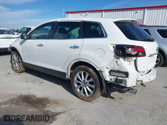 2014 Mazda CX-9 Grand Touring with VIN JM3TB3DA8E0427369, listed as a IAAI auction lot 41860129 with 152,888 mi miles and . Bid and sale history available at DreamBid. Image 3.