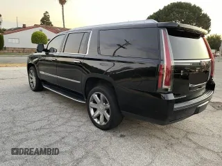 2018 Cadillac Escalade ESV Luxury z VIN 1GYS3HKJ2JR139302, wystawiony jako Copart lot #74639524 z przebiegiem 154 097 mil mil oraz Czysty tytuł • Clean title. Historia ofert i sprzedaży dostępna na DreamBid. Obrazek 3.