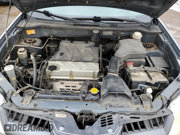 2005 Mitsubishi Outlander z VIN JA4LZ41F75U601526, wystawiony jako Copart lot #50974665 z przebiegiem 265 611 mil mil oraz Szkoda całkowita • Salvage title. Historia ofert i sprzedaży dostępna na DreamBid. Obrazek 12.
