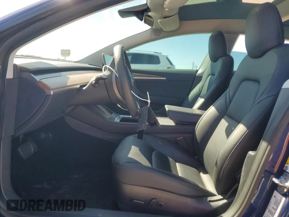 2022 Tesla Model 3 with VIN 5YJ3E1EA8NF322335, listed as a Copart auction lot 48187265 with 22,265 mi miles and Clean Title. Bid and sale history available at DreamBid. Image 7.