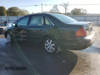 2001 Toyota Avalon XL z VIN 4T1BF28B81U162506, wystawiony jako Copart lot #52031805 z przebiegiem 212 437 mil mil oraz Szkody całkowita. Historia ofert i sprzedaży dostępna na DreamBid. Obrazek 2.
