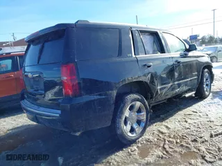 2016 Chevrolet Tahoe LTZ with VIN 1GNSKCKCXGR274864, listed as a IAAI auction lot 41428433 with 117,365 mi miles. Bid and sale history available at carsss.com. Image 4.