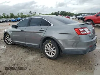 2014 Ford Taurus SE z VIN 1FAHP2D86EG143517, wystawiony jako Copart lot #51066975 z przebiegiem 134 892 mil mil oraz Szkoda całkowita • Salvage title. Historia ofert i sprzedaży dostępna na DreamBid. Obrazek 2.